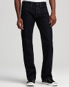 Hoyle Jackson's dark washed denim sports a slim cut for modern appeal.