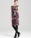 This lace overlay French Connection dress flaunts a beautiful, richly-colored floral print in a stylish,knee-skimming silhouette.