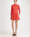 Timeless cotton dress in a feminine, vintage-inspired floral print with a funnelneck, pleated skirt and convenient back zipper. FunnelneckLong sleevesPleated skirtBack zipperAbout 19 from natural waistCottonDry cleanImportedModel shown is 5'10 (177cm) wearing US size 4.