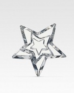 An exquisitely crafted paperweight in pure lead crystal is designed in a stack of three stars with sparkling clarity. 4¾W X 1½H Hand wash Made in France