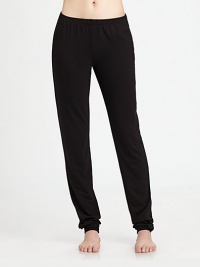 A slim, yet comfortable style in a soft knit jersey. Elastic waistbandInseam, about 3467% polyester/33% rayonMachine washImported A slim, yet comfortable style in a soft knit jersey. Elastic waistbandInseam, about 3467% polyester/33% rayonMachine washImported
