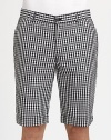 Crisp, cool style you'll look for season after season, tailored in a updated, gingham-print from lightweight, breathable cotton.Flat-front styleSide slash, back welt pocketsInseam, about 12CottonMachine washImported