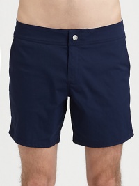 A simple solid design crafted in quick-drying nylon, with a flat waistband and magnetic snap front, complete with a water-proof pouch.Elastic drawstring waistSide slash, back flap pocketsInseam, about 594% polyamide/6% elastaneMachine washImported A simple solid design crafted in quick-drying nylon, with a flat waistband and magnetic snap front, complete with a water-proof pouch.Elastic drawstring waistSide slash, back flap pocketsInseam, about 594% polyamide/6% elastaneMachine washImported