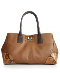 Fall head over heels for this modern girl must-have from Furla. A roomy shopper design crafted from gorgeous leather detailed with python print trim and goldtone hardware. Fall head over heels for this modern girl must-have from Furla. A roomy shopper design crafted from gorgeous leather detailed with python print trim and goldtone hardware.