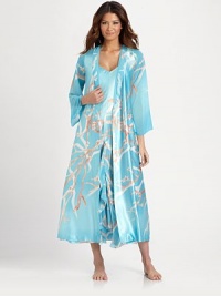 EXCLUSIVELY AT SAKS. Simply beautiful and fresh, this silky-smooth layering piece blossoms with an allover print and is finished with sheer illusion sleeves. Crossover v-neck frontLong sheer sleevesSelf-tie waistDual slit pocketsAbout 53 from shoulder to hemPolyesterMachine washImported