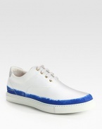 Kick into high gear in this futuristic, high-top sneaker with contrast color detail, finished with a long-lasting canvas upper.Canvas upperLeather liningPadded insoleRubber soleMade in Italy