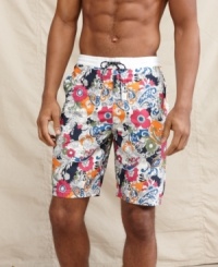 It's time to start looking on the bright side. A floral print adds some pep to your poolside style on these swim shorts from Tommy Hilfiger. It's time to start looking on the bright side. A floral print adds some pep to your poolside style on these swim shorts from Tommy Hilfiger.