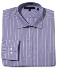 Bring a dapper new twist to your dress wardrobe with this crisp striped shirt from Tommy Hilfiger. Bring a dapper new twist to your dress wardrobe with this crisp striped shirt from Tommy Hilfiger.