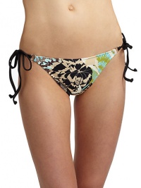 THE LOOKTropical printElastic waist and leg openingsSide ties with O-ringsTHE MATERIAL80% nylon/20% spandexCARE & ORIGINHand washMade in USA of imported fabricPlease note: Bikini top sold separately. THE LOOKTropical printElastic waist and leg openingsSide ties with O-ringsTHE MATERIAL80% nylon/20% spandexCARE & ORIGINHand washMade in USA of imported fabricPlease note: Bikini top sold separately.