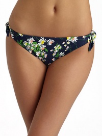 Sunny daisies grow throughout this stretch nylon style with side ties for added charm.Elastic waistband Side ties Fully lined 80% nylon/20% spandex Fully lined Hand wash Made in USA of imported fabricPlease note: Bikini top sold separately. Sunny daisies grow throughout this stretch nylon style with side ties for added charm.Elastic waistband Side ties Fully lined 80% nylon/20% spandex Fully lined Hand wash Made in USA of imported fabricPlease note: Bikini top sold separately.