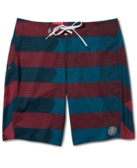 Don't be bored by your board shorts, this boldly striped pair by Volcom will having you swimming in style. Don't be bored by your board shorts, this boldly striped pair by Volcom will having you swimming in style.