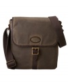 Keep all your necessities convenient while you stay hands-free with this leather-trimmed bag from Fossil.
