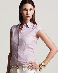 Darts lend a tailored fit to this softly hued Theory top, designed with femme cap sleeves and a coquettish scallop hem for a charming office look. Darts lend a tailored fit to this softly hued Theory top, designed with femme cap sleeves and a coquettish scallop hem for a charming office look.