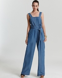 Flaunt '70-inspired style in a MARC BY MARC JACOBS jumpsuit and work retro flair at its best. The wide-leg silhouette is pleated at the bodice, belted at the waist and boasts a square neckline for a truly cool look for day or night. Wedges finish the look with authentic appeal. Flaunt '70-inspired style in a MARC BY MARC JACOBS jumpsuit and work retro flair at its best. The wide-leg silhouette is pleated at the bodice, belted at the waist and boasts a square neckline for a truly cool look for day or night. Wedges finish the look with authentic appeal.