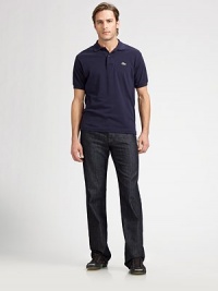 A sleek, dark wash and classic fit to dress up with a blazer or down with a polo. Five-pocket style Button fly Inseam, about 33 Cotton/spandex; machine wash Made in USA A sleek, dark wash and classic fit to dress up with a blazer or down with a polo. Five-pocket style Button fly Inseam, about 33 Cotton/spandex; machine wash Made in USA