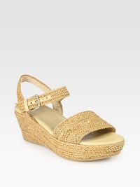 Wondrously woven lanyard with an adjustable ankle strap and a chunky wedge. Self-covered wedge, 2½ (65mm)Covered platform, 1½ (40mm)Compares to a 1 heel (25mm)Lanyard upperLeather liningRubber solePadded insoleImportedbr>OUR FIT MODEL RECOMMENDS ordering true size. Wondrously woven lanyard with an adjustable ankle strap and a chunky wedge. Self-covered wedge, 2½ (65mm)Covered platform, 1½ (40mm)Compares to a 1 heel (25mm)Lanyard upperLeather liningRubber solePadded insoleImportedbr>OUR FIT MODEL RECOMMENDS ordering true size.
