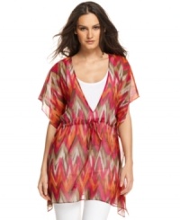 In a global-inspired print, this MICHAEL Michael Kors sheer tunic is perfect for layering on a bit of boho-chic to your spring look! In a global-inspired print, this MICHAEL Michael Kors sheer tunic is perfect for layering on a bit of boho-chic to your spring look!