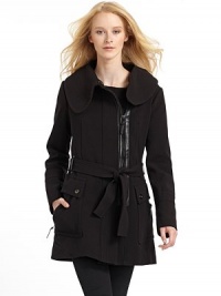 THE LOOKTopstitched Peter Pan collar with hook-and-eye closureOff-center zip frontTie-front beltLeather trim at placket and belt loopsLong sleevesDual snap flap pockets with exterior zippersPiped back yokeLogo detail on back gun flapBack belt loopTHE FITAbout 33 from shoulder to hemTHE MATERIALShell: 63% polyester/33% rayon/4% spandexTrim: leatherFully linedCARE & ORIGINDry cleanImported THE LOOKTopstitched Peter Pan collar with hook-and-eye closureOff-center zip frontTie-front beltLeather trim at placket and belt loopsLong sleevesDual snap flap pockets with exterior zippersPiped back yokeLogo detail on back gun flapBack belt loopTHE FITAbout 33 from shoulder to hemTHE MATERIALShell: 63% polyester/33% rayon/4% spandexTrim: leatherFully linedCARE & ORIGINDry cleanImported