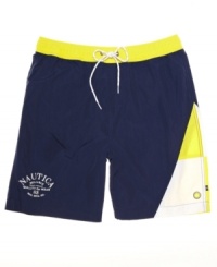 Short shorts? Not here. These trunks from Nautica add just a touch of length to your look for summer. Short shorts? Not here. These trunks from Nautica add just a touch of length to your look for summer.