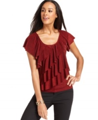 Tiered ruffles add pizzazz to this Elementz top. Pair it with slim black pants for a no-fuss look! Tiered ruffles add pizzazz to this Elementz top. Pair it with slim black pants for a no-fuss look!