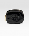Keep your beauty essentials handy with this versatile patent leather look finished with the iconic logo at the front.Top zip closure Fully lined 5½W X 4H X 2½D Imported