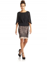 THE LOOKScoopneckStudded three-quarter length sleeves with draped cuffsPleated frontBanded waist with elastic backKeyhole back button closureTHE FITAbout 20 from shoulder to hemTHE MATERIALPolyesterCARE & ORIGINDry cleanImportedModel shown is 5'8 (172½cm) wearing US size Small. THE LOOKScoopneckStudded three-quarter length sleeves with draped cuffsPleated frontBanded waist with elastic backKeyhole back button closureTHE FITAbout 20 from shoulder to hemTHE MATERIALPolyesterCARE & ORIGINDry cleanImportedModel shown is 5'8 (172½cm) wearing US size Small.