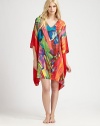 Vivid colors swirl on this flowing animal-inspired design of silky-smooth material. V-neckThree-quarter length dolman sleevesAbout 36 from shoulder to hemPolyesterMachine washImported