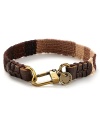 Leather and brasstone hardware bring a city edge to this canvas bracelet from Caputo.
