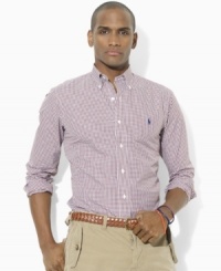 Defined by classic gingham, this trim-fitting sport shirt in crisp cotton poplin is essential for preppy style. Defined by classic gingham, this trim-fitting sport shirt in crisp cotton poplin is essential for preppy style.