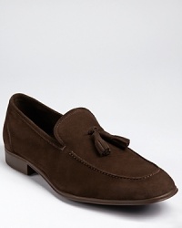 Striking in its soft suede and tassels, this dress loafer captures your look in one easy step. Striking in its soft suede and tassels, this dress loafer captures your look in one easy step.
