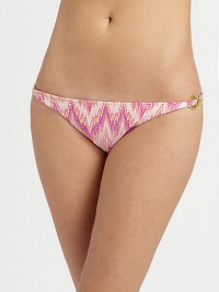 A classic swim design featuring an irresistible pastel print and glamorous gold hardware. This bottom also offers a flawless fit, thanks to the right amount of stretch.Stretch comfortGold hardware on hipsFully lined80% nylon/20% Lycra®Hand washMade in USA of imported fabric Please note: Bikini top sold separately. A classic swim design featuring an irresistible pastel print and glamorous gold hardware. This bottom also offers a flawless fit, thanks to the right amount of stretch.Stretch comfortGold hardware on hipsFully lined80% nylon/20% Lycra®Hand washMade in USA of imported fabric Please note: Bikini top sold separately.