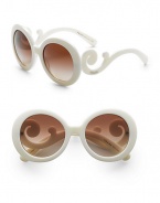 Sophisticated design in a round shape with lavish baroque accents. Available in blue with gradient blue lens, black with gradient gray lens, white with gradient brown lens, tortoise with gradient brown lens, tan with brown gradient lens or havana with purple gradient lens.Acetate frame with APX lens 100% UV protective Made in Italy