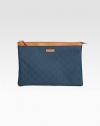 Nylon Guccissima trimmed with leather in a zip-top pouch.Top zip closureFully lined12W X 8½H X 1/4DMade in Italy