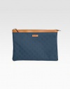 Nylon Guccissima trimmed with leather in a zip-top pouch.Top zip closureFully lined12W X 8½H X 1/4DMade in Italy