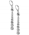 Streamline your style with sleek crystal linear earrings by Givenchy. Silvertone. Length measures 1-7/8 inches.