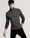 Burberry's sleek sweater rendered in a weathered garment wash for a comfy, lived-in look.