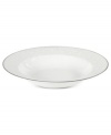 Gracefully understated, the Tanglewood rim soup bowl by Mikasa is swept with romantic scrolling florals in pure white. A polished platinum edge refines already-elegant porcelain to enhance every occasion.