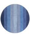 Hand-tufted, blended wool gives an exceptionally soft feel to this rug from the Coastal Treasures collection. In a shimmering, striped design of ocean-blue colorways, this sophisticated piece adds serene character to every decor.