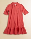 A favorite polo becomes a sweet dress, with a feminine ruffle, in airy pique knit.Ribbed polo collarElbow-length sleeves with ribbed cuffsButton placketAppliqued logo on chestWide ruffle at hemCottonMachine washImported Please note: Number of buttons may vary depending on size ordered. 