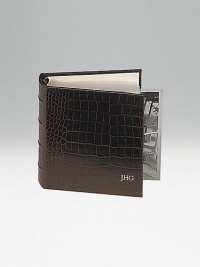 Crafted of crocodile-embossed Italian calfskin, this handsome design is the perfect way to store and display treasured photos. 18 clear pocket leaves hold 36, 4 X 6 photos 5½ X 6¾ Made in USAFOR PERSONALIZATIONSelect a color and quantity, then scroll down and click on PERSONALIZE & ADD TO BAG to choose and preview your monogramming options. Please allow 1 week for delivery. Crafted of crocodile-embossed Italian calfskin, this handsome design is the perfect way to store and display treasured photos. 18 clear pocket leaves hold 36, 4 X 6 photos 5½ X 6¾ Made in USAFOR PERSONALIZATIONSelect a color and quantity, then scroll down and click on PERSONALIZE & ADD TO BAG to choose and preview your monogramming options. Please allow 1 week for delivery.