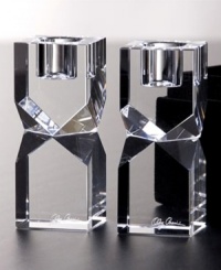 Give decor a distinctly modern edge with Lexington candle holders. Heavy crystal cut in bold geometric shapes bring acclaimed designer Oleg Cassini's keen sense of style right into your living room. Give decor a distinctly modern edge with Lexington candle holders. Heavy crystal cut in bold geometric shapes bring acclaimed designer Oleg Cassini's keen sense of style right into your living room.