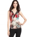 Add a pop of print to your suit basics with this cowl-neck top from Calvin Klein.