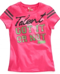 She's definitely got style in spades thanks to this graphic, electric-pink tee from Puma. She's definitely got style in spades thanks to this graphic, electric-pink tee from Puma.