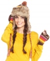 Give the cold weather the slip with this super-cozy, faux fur trapper hat from Steve Madden that features a tribal print pattern topped off by a precious pom pom.
