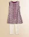 Keep her cool in this hand-smocked appliqué dress covered in a berry-hued floral print. Round neckSleevelessCenter smocked appliqué with ruffled trimBack zipFully lined70% cotton viscose/30% cottonHand wash or dry cleanImported