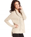 A high-low hem ups the edge on this Kensie cable-knit sweater for a look that's fashionably fall!