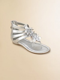 Glistening metallic faux leather, styled with pretty flowers in front and delicate straps around the ankle.Faux metallic polyurethane upperT strap thong with flowers and crystal accentsMulti ankle strapsZipper at backRubber solePadded insoleFaux leather liningImported Glistening metallic faux leather, styled with pretty flowers in front and delicate straps around the ankle.Faux metallic polyurethane upperT strap thong with flowers and crystal accentsMulti ankle strapsZipper at backRubber solePadded insoleFaux leather liningImported