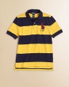 A colorful striped design and Big Pony accent the classic polo shirt in lightweight cotton mesh.Pointed polo collarShort sleevesButton-frontUneven vented hemCottonMachine washImported Please note: Number of buttons may vary depending on size ordered. 