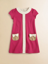 Charmingly crafted in a colorblocked design with bow-adorned front pockets, this sweet A-line frock will be an instant fave.Round necklineShort puff sleevesBack buttonsFront patch pocketsCotton/Polyester/SpandexMachine washImported Please note: Number of buttons may vary depending on size ordered. 