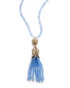 THE LOOKFeminine Metals collectionAquamarine-colored beadsRhinestone ball and flower pendantAquamarine-colored tassel accent14k goldplated settingNo closure; slip-on styleTHE MEASUREMENTPendant length, about 4Length, about 32ORIGINImported